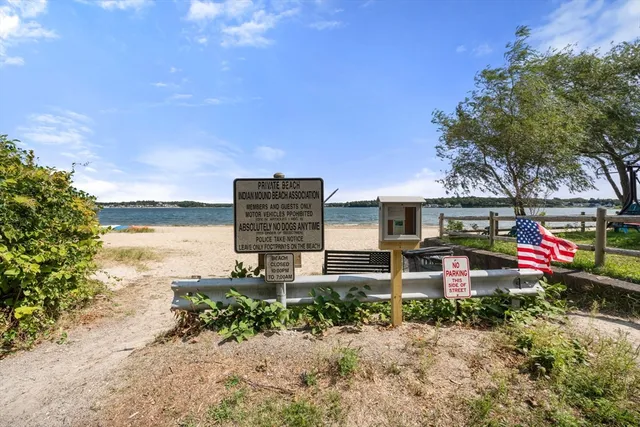 a front view of a house with an ocean view