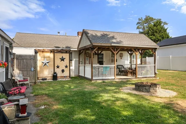 a view of a backyard with a house