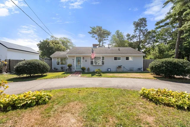 a front view of a house with swimming pool