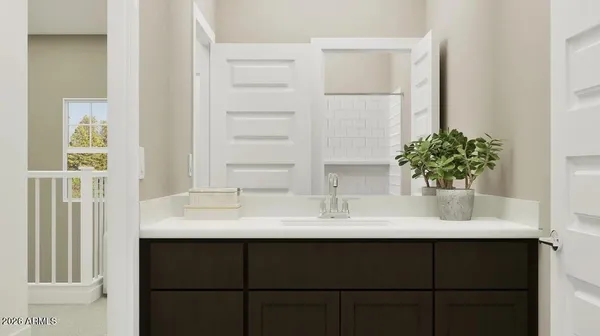 a bedroom with a bed and painting on the wall