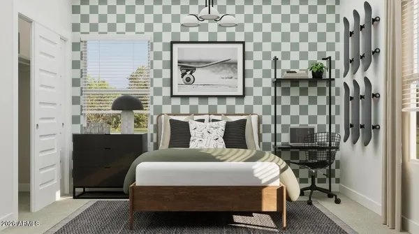 a bedroom with a bed and a table