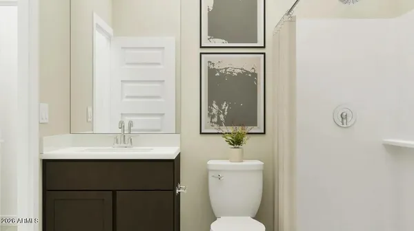 a bedroom with a bed and a wall painting