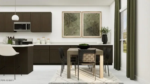 a kitchen with a sink and a refrigerator