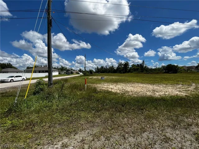 a view of a golf course with a lake