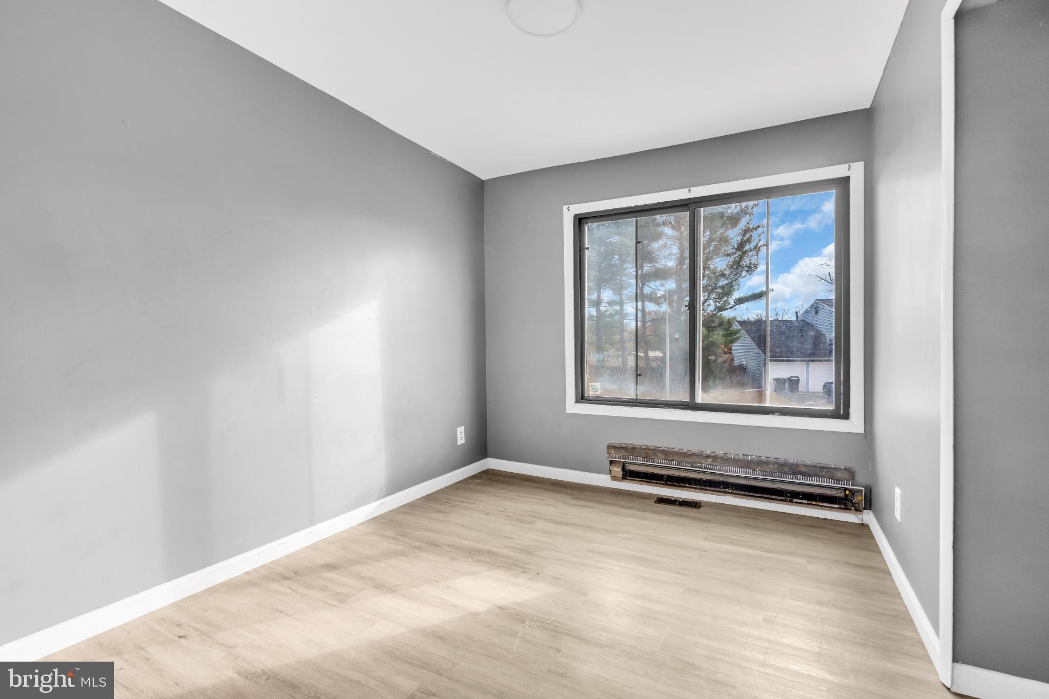 22 Pershing Lane Sicklerville, NJ 08081 - Photo 20 of 34 a view of an empty room with a window