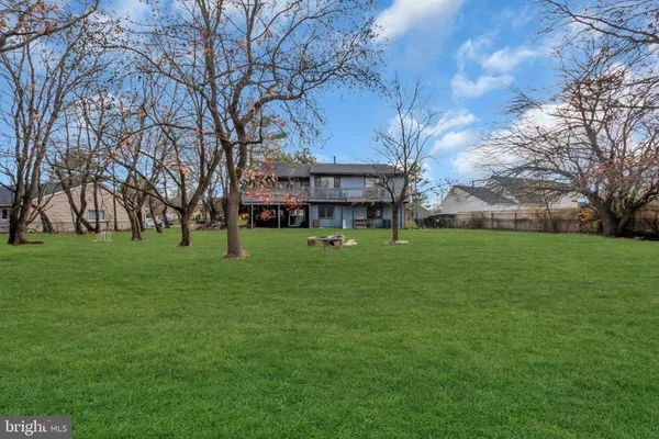 a view of a building with a big yard