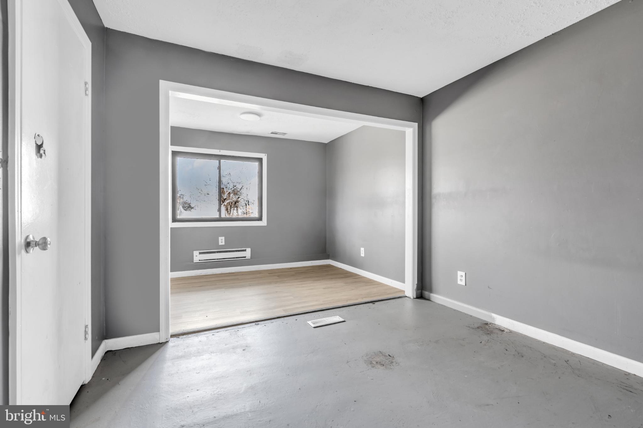 22 Pershing Lane Sicklerville, NJ 08081 - Photo 8 of 34 an empty room with windows and mirror