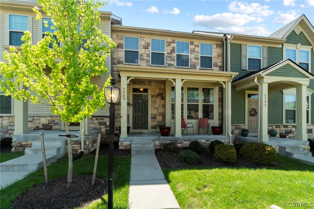 5505 Riverside Heights Way Richmond, VA 23225 - Photo 1 of 30 a front view of a house with a yard