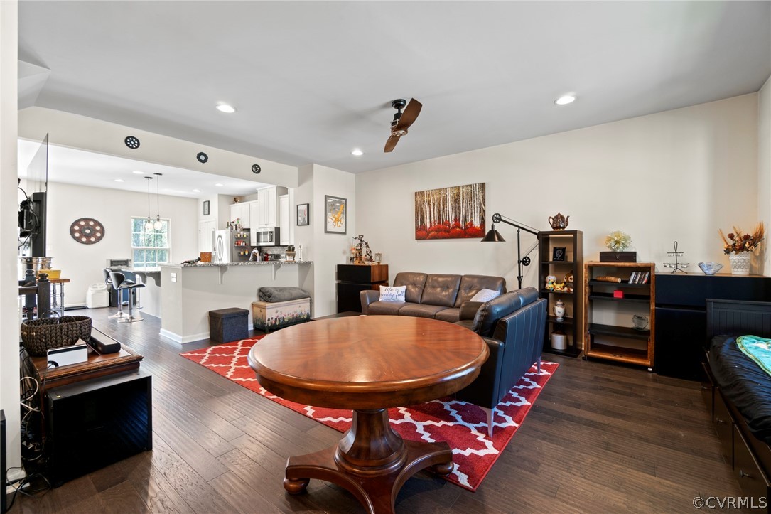 5505 Riverside Heights Way Richmond, VA 23225 - Photo 11 of 30 a living room with furniture and kitchen view