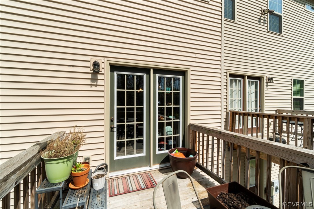 5505 Riverside Heights Way Richmond, VA 23225 - Photo 29 of 30 a view of a chair and table in the balcony