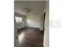 a view of a room that has a window in it