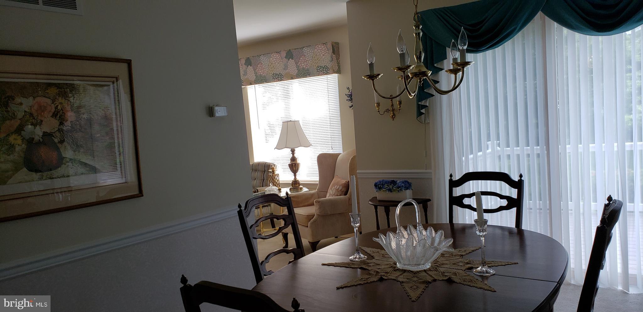 101 Register Drive Newark, DE 19711 - Photo 6 of 21 dining room with slider to outside Trex deck