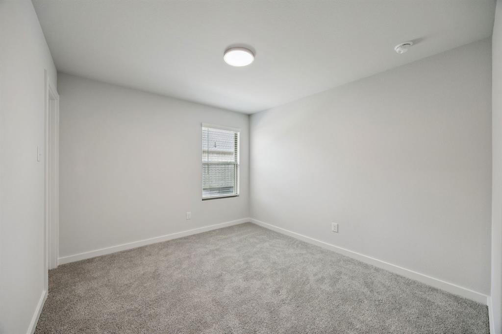 1868 Gallop Road Seagoville, TX 75159 - Photo 15 of 27 a view of an empty room with a window
