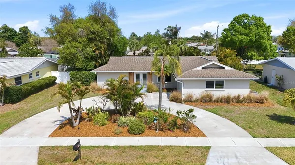 a view of outdoor space with palm trees