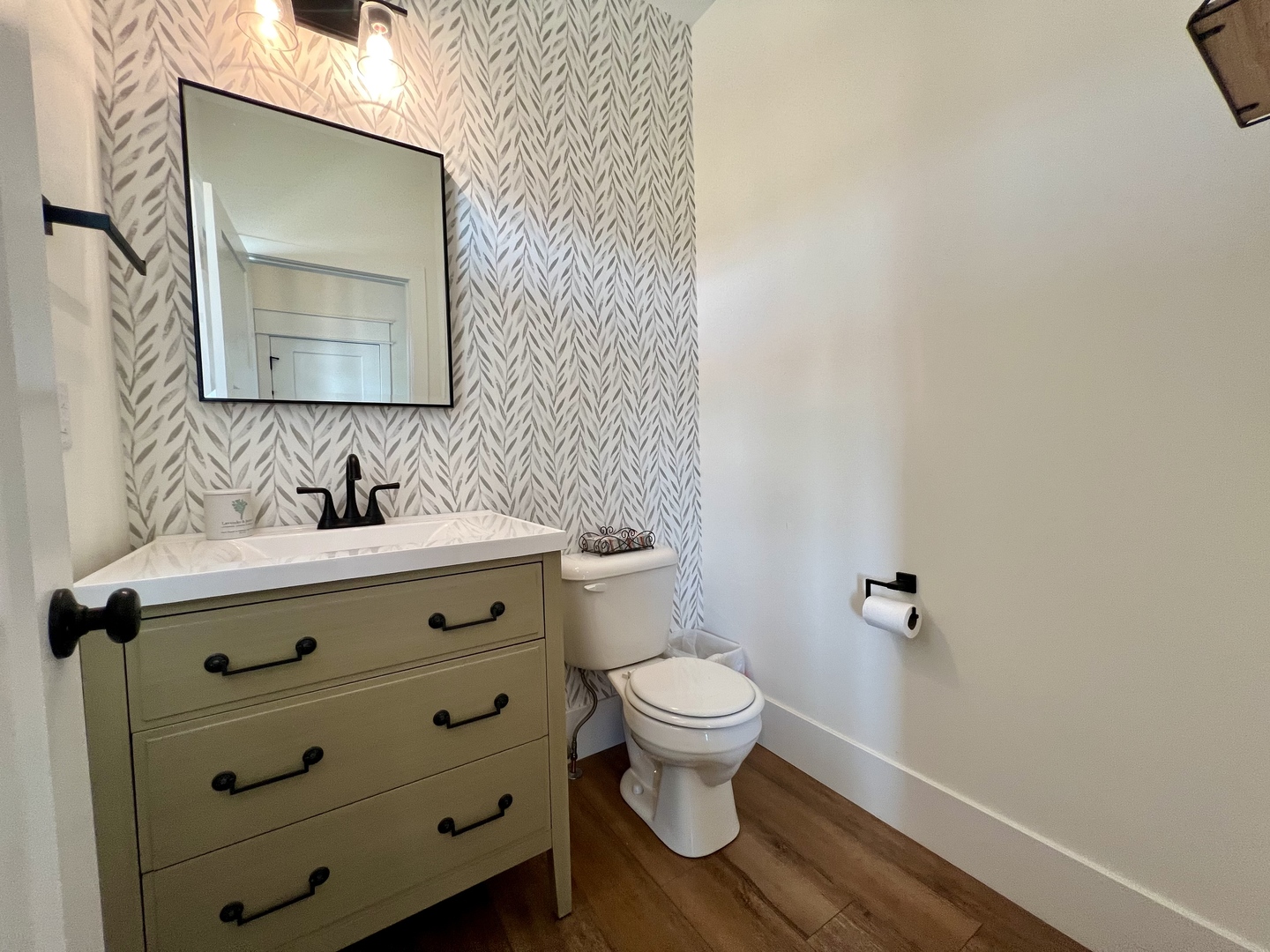 7845 Fitzgerald Road Clinton, IL 61727 - Photo 18 of 62 a bathroom with a sink and a mirror