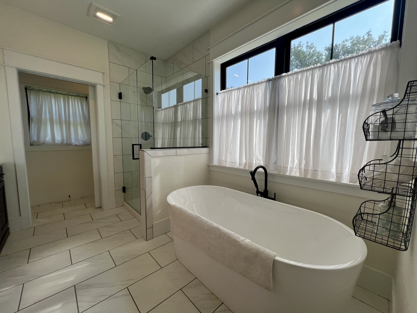 7845 Fitzgerald Road Clinton, IL 61727 - Photo 27 of 62 a bathroom with a sink a toilet and shower