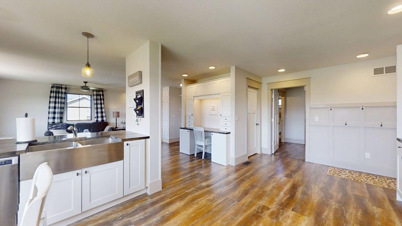 7845 Fitzgerald Road Clinton, IL 61727 - Photo 36 of 62 a large kitchen with a lot of counter space and wooden floor