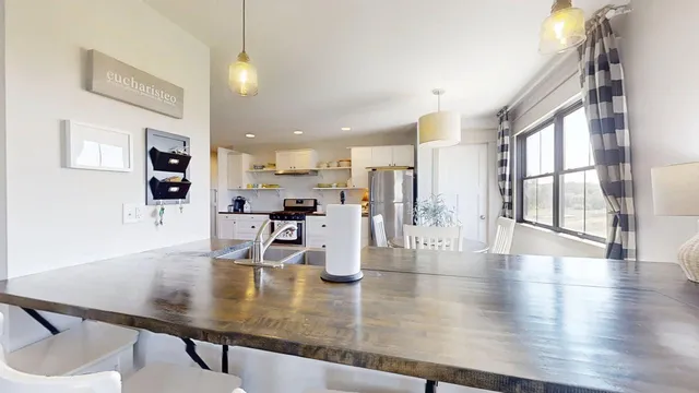 a bathroom with a double vanity sink and mirror
