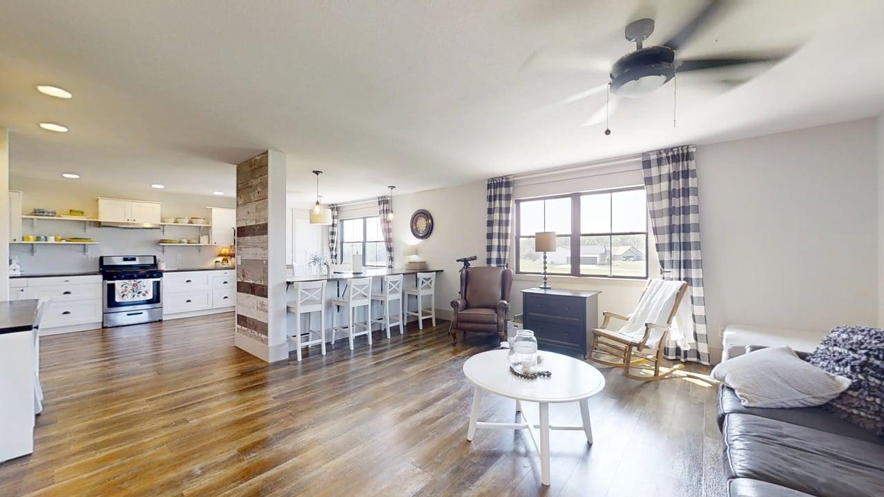 7845 Fitzgerald Road Clinton, IL 61727 - Photo 41 of 62 a living room with furniture and a wooden floor