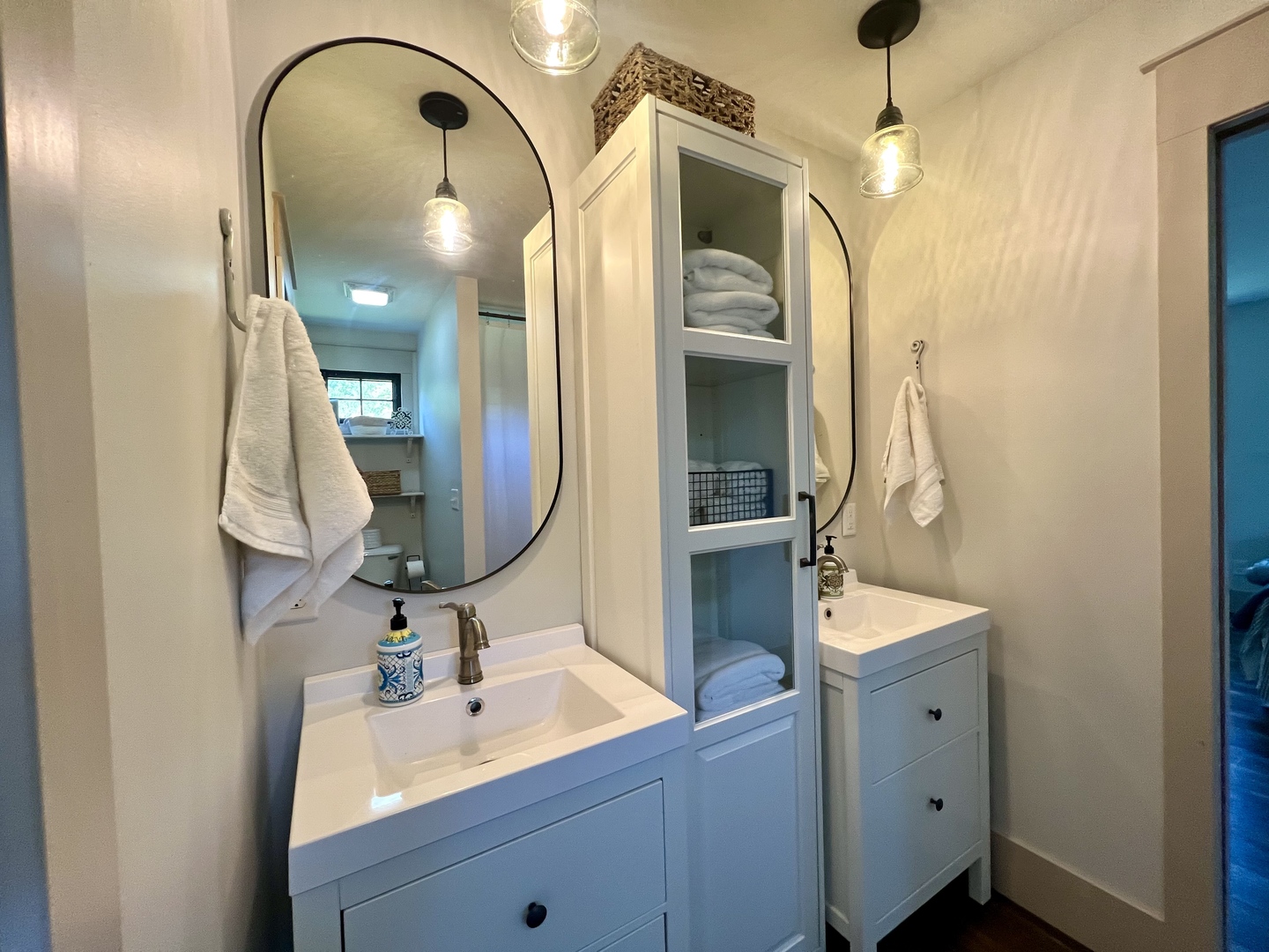 7845 Fitzgerald Road Clinton, IL 61727 - Photo 45 of 62 a bathroom with a double vanity sink and mirror