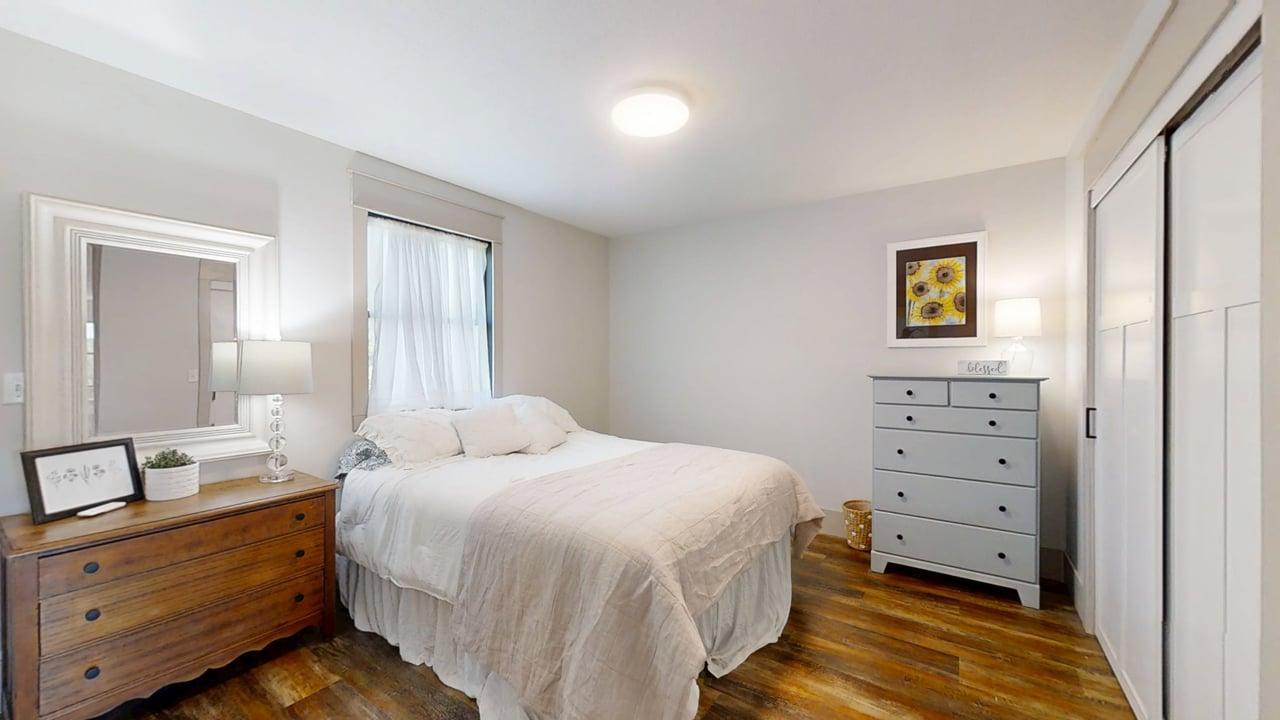 7845 Fitzgerald Road Clinton, IL 61727 - Photo 49 of 62 a bedroom with a bed and a dresser