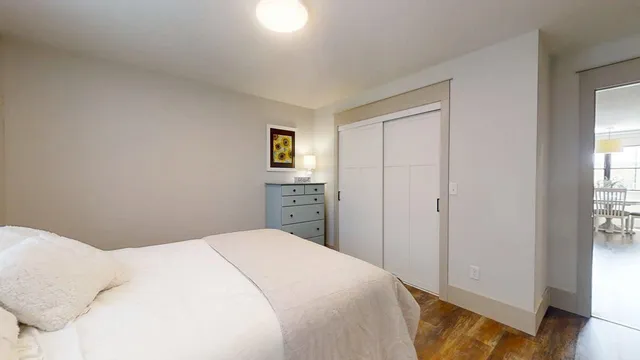 a view of a livingroom with furniture and a garage