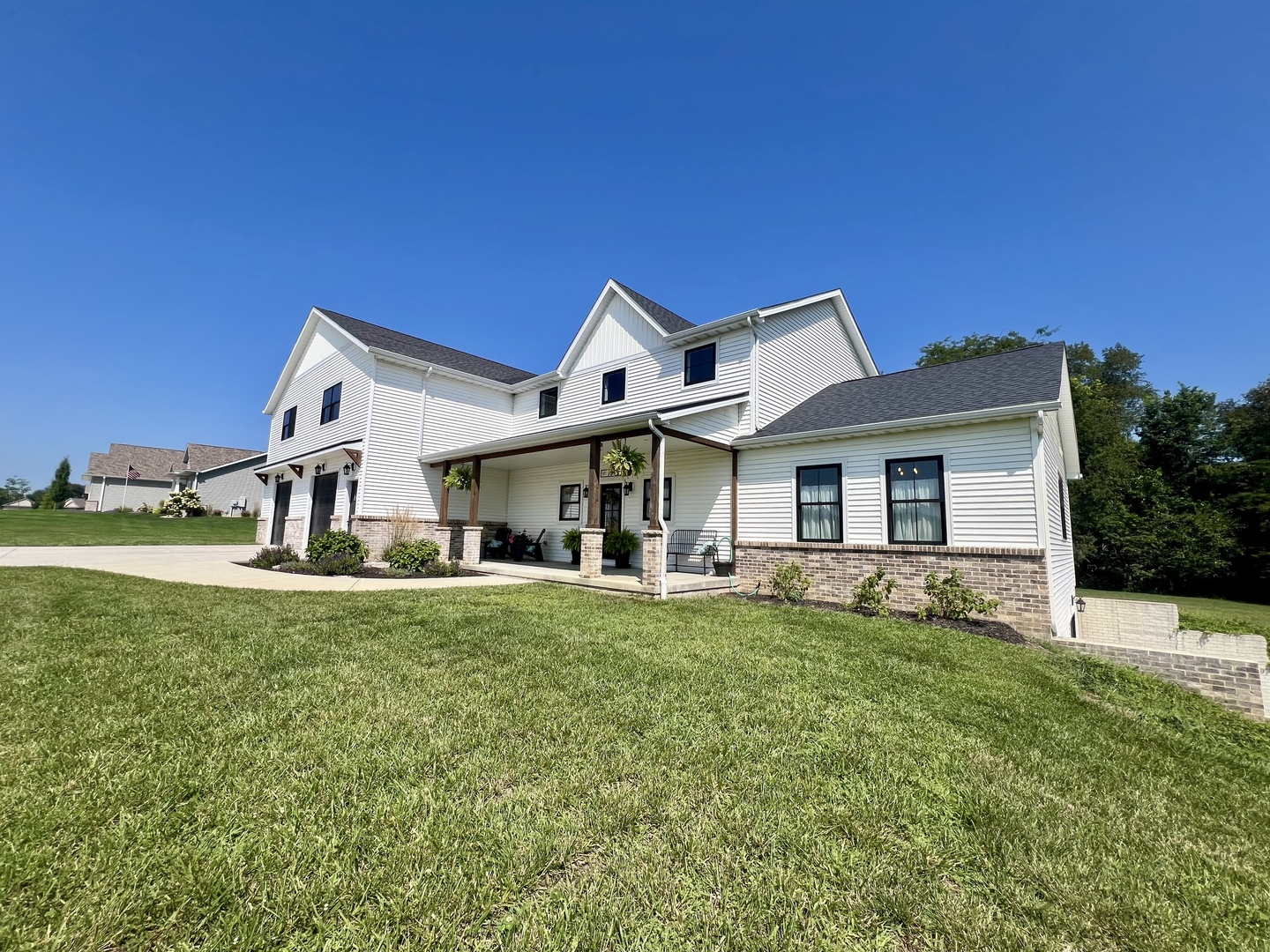7845 Fitzgerald Road Clinton, IL 61727 - Photo 60 of 62 front view of a house with a big yard