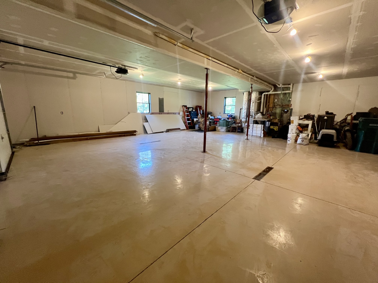 7845 Fitzgerald Road Clinton, IL 61727 - Photo 62 of 62 a view of a livingroom with furniture and a garage