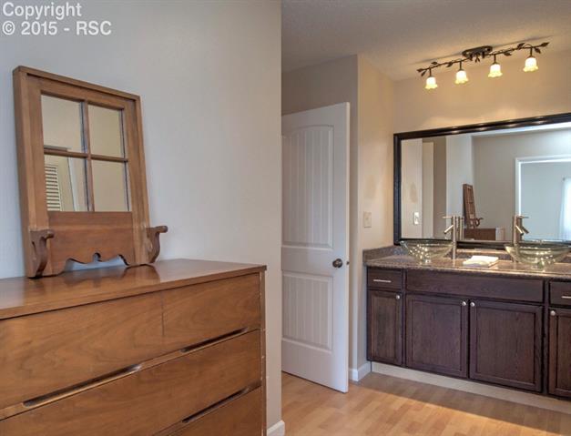 2608 Rigel Drive Colorado Springs, CO 80906 - Photo 15 of 26 upgraded bathroom on upper level.