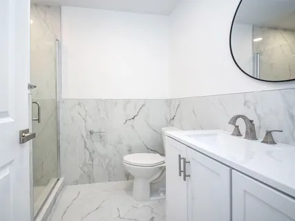 a view of a kitchen with a sink
