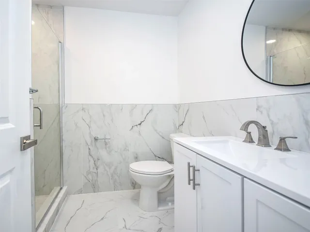 a view of a kitchen with a sink