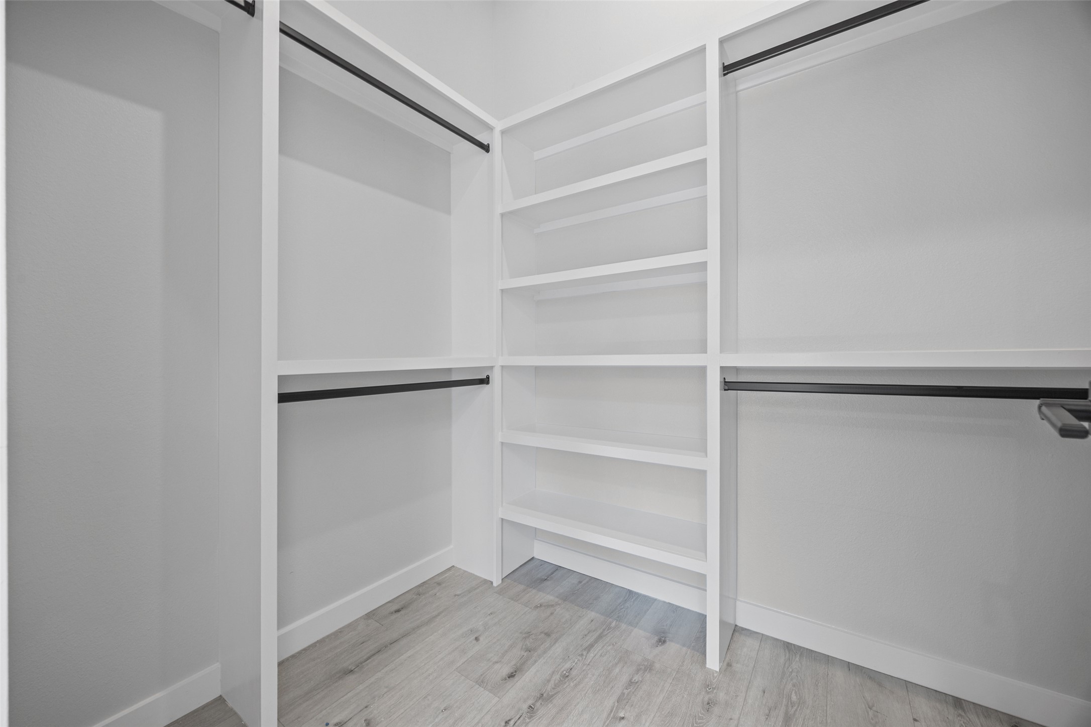 2000 Riverside Farms Road, Unit 5102 Austin, TX 78741 - Photo 13 of 25 Ample shelving and hanging space defines this organized closet, ready for personalized storage solutions.