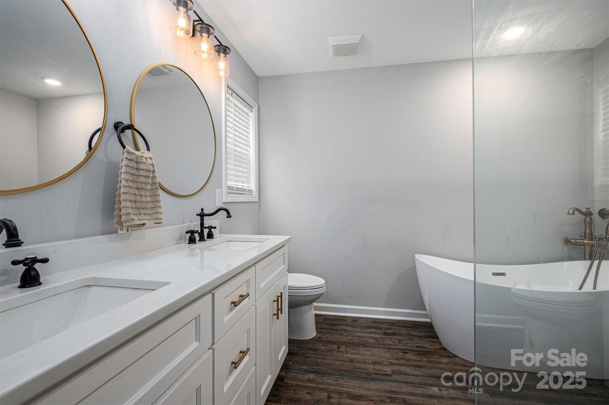 7430 Houser Farm Road Cherryville, NC 28021 - Photo 17 of 22 a bathroom with a sink a toilet and a mirror