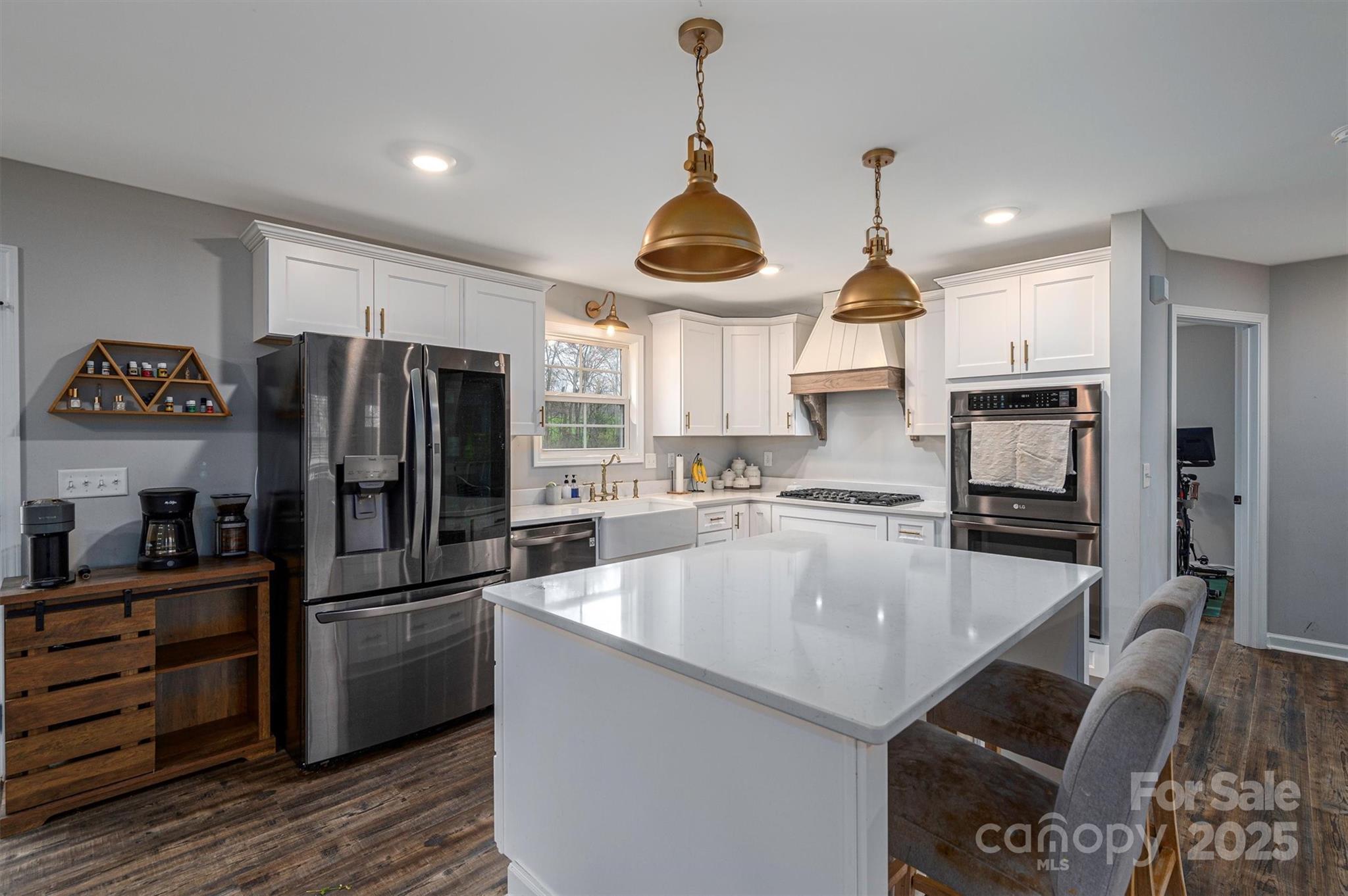 7430 Houser Farm Road Cherryville, NC 28021 - Photo 6 of 22 a large kitchen with stainless steel appliances granite countertop a refrigerator a oven and a sink