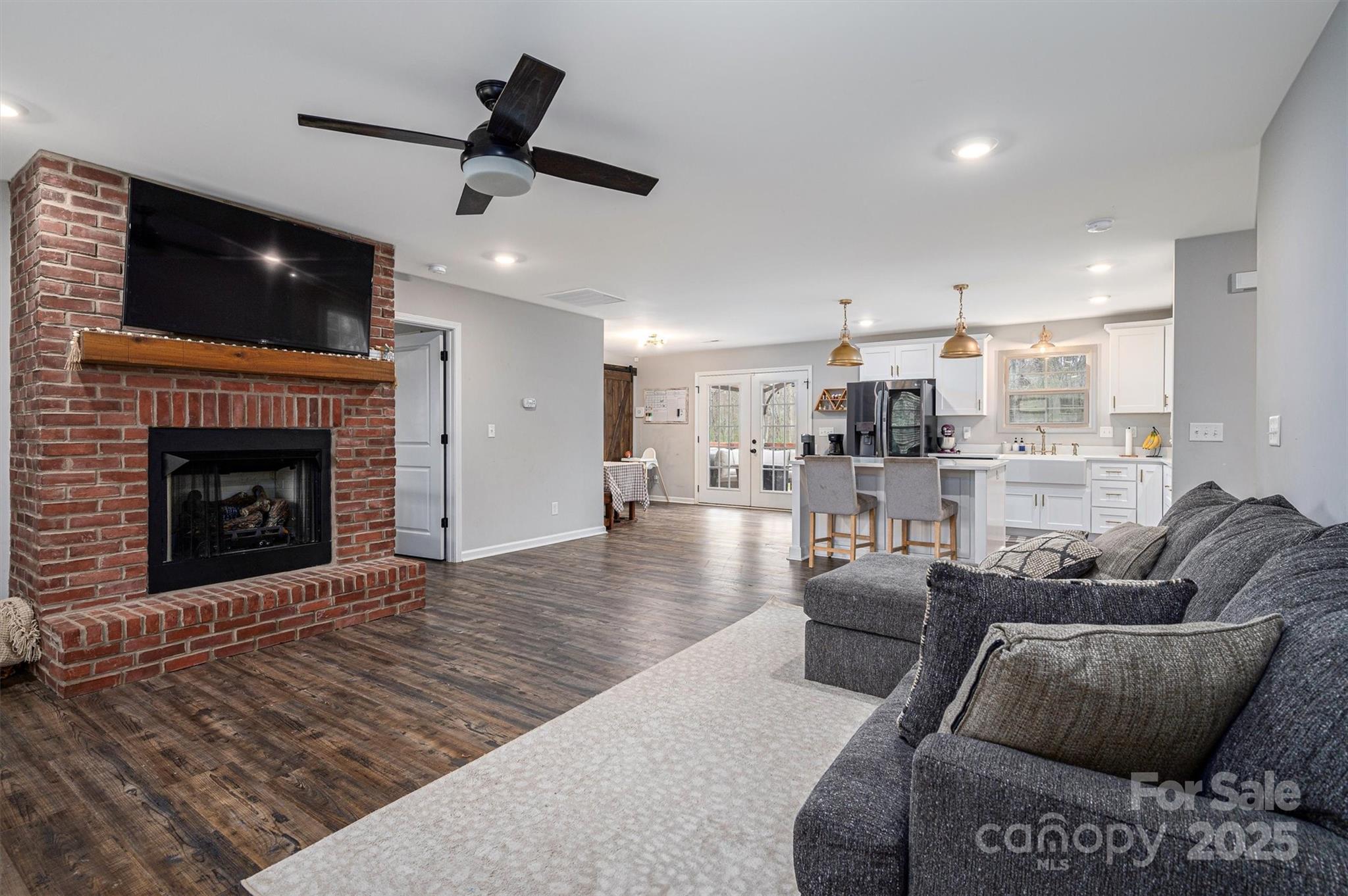 7430 Houser Farm Road Cherryville, NC 28021 - Photo 10 of 22 a living room with furniture and a fireplace