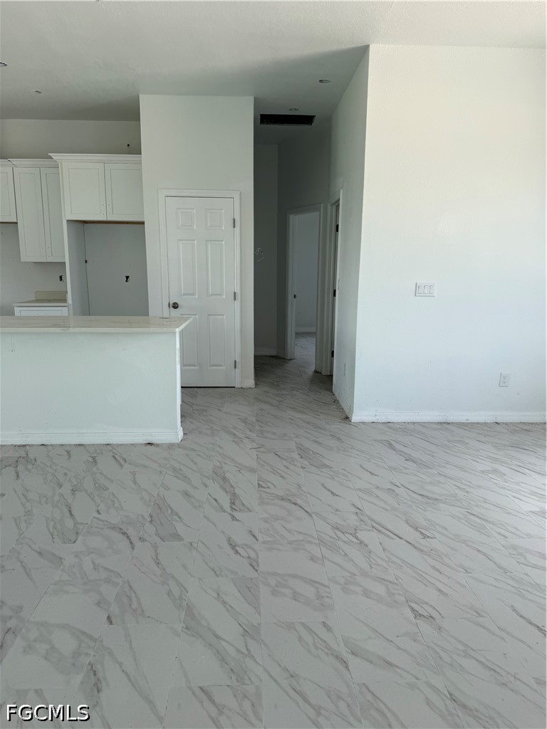 10658 Rainsville Street Port Charlotte, FL 33981 - Photo 11 of 21 a view of kitchen with white cabinets