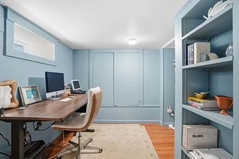 a view of a livingroom with furniture and a living room