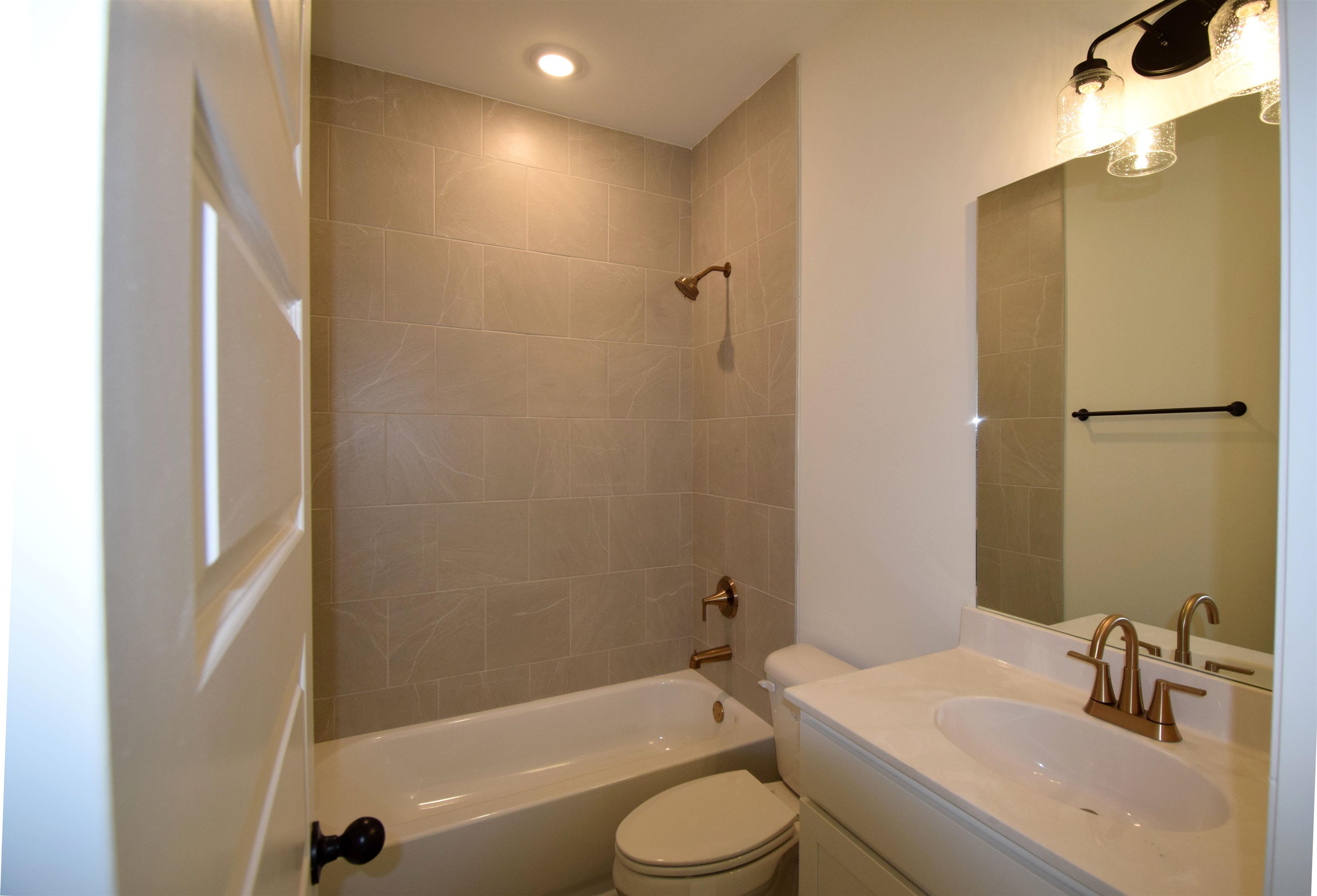 207 Centerline Roper Loop Byhalia, MS 38611 - Photo 17 of 23 a bathroom with a sink toilet and shower