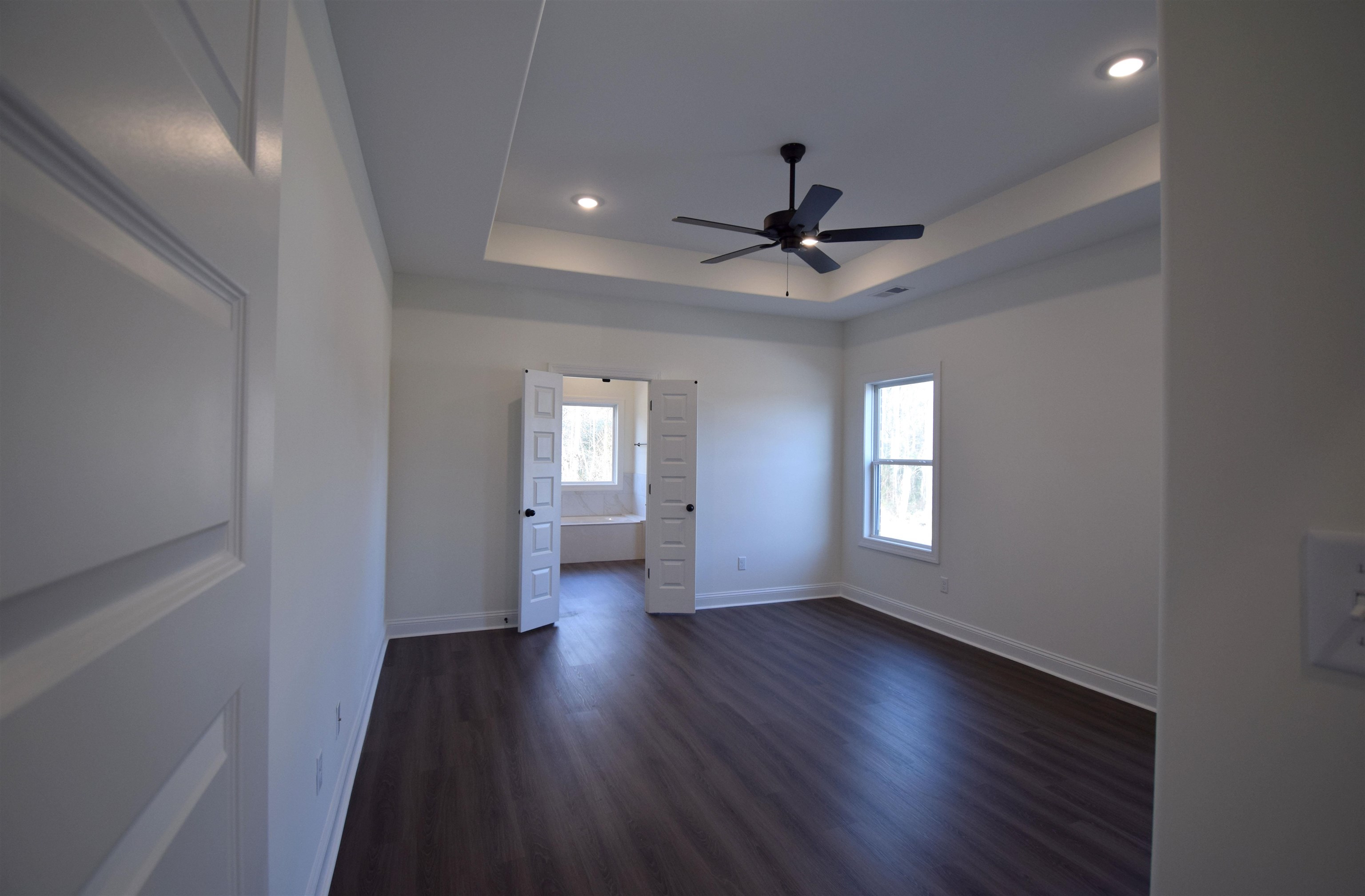 207 Centerline Roper Loop Byhalia, MS 38611 - Photo 19 of 23 wooden floor in an empty room with a window