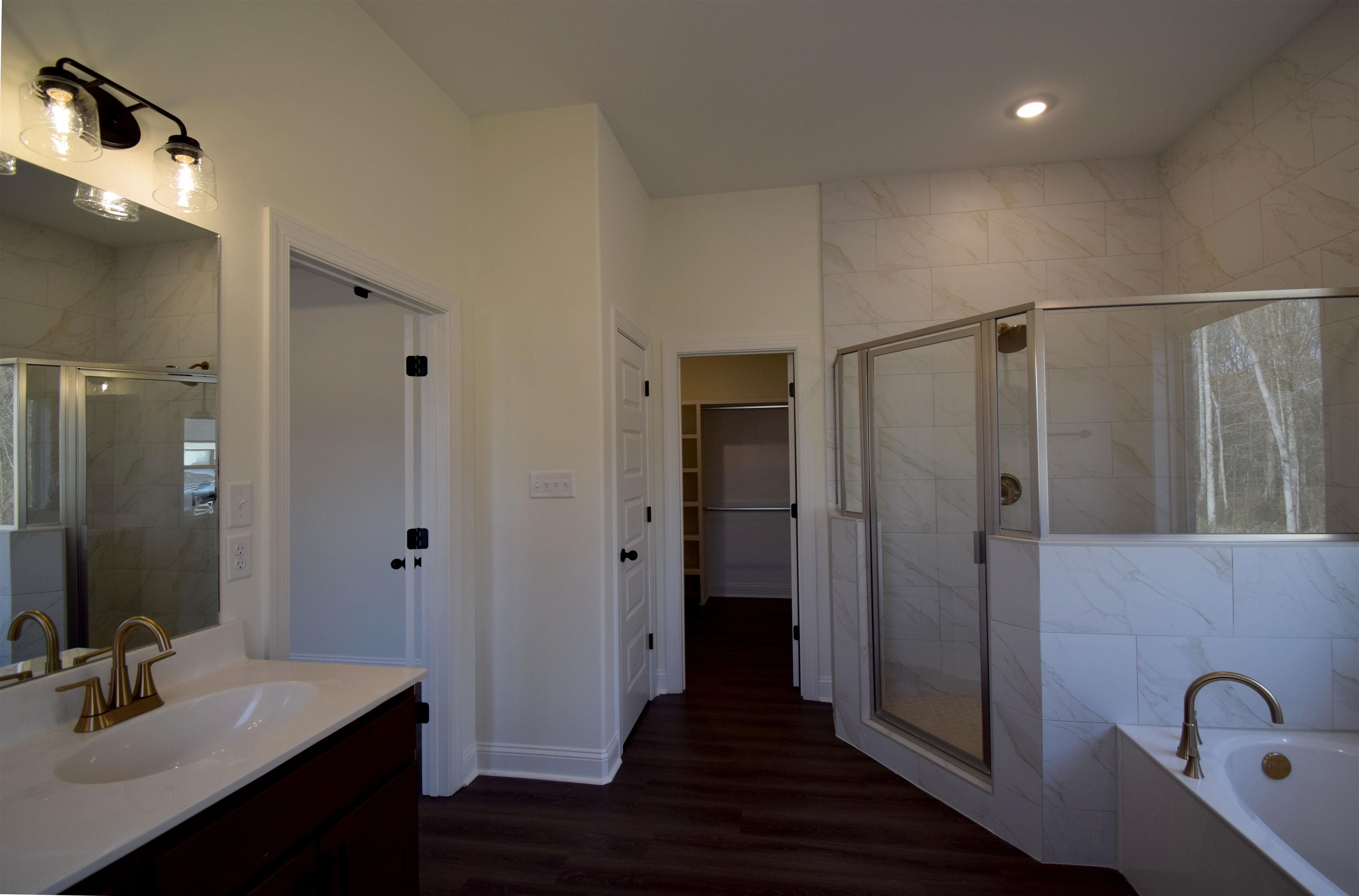 207 Centerline Roper Loop Byhalia, MS 38611 - Photo 21 of 23 a bathroom with a sink shower and a mirror