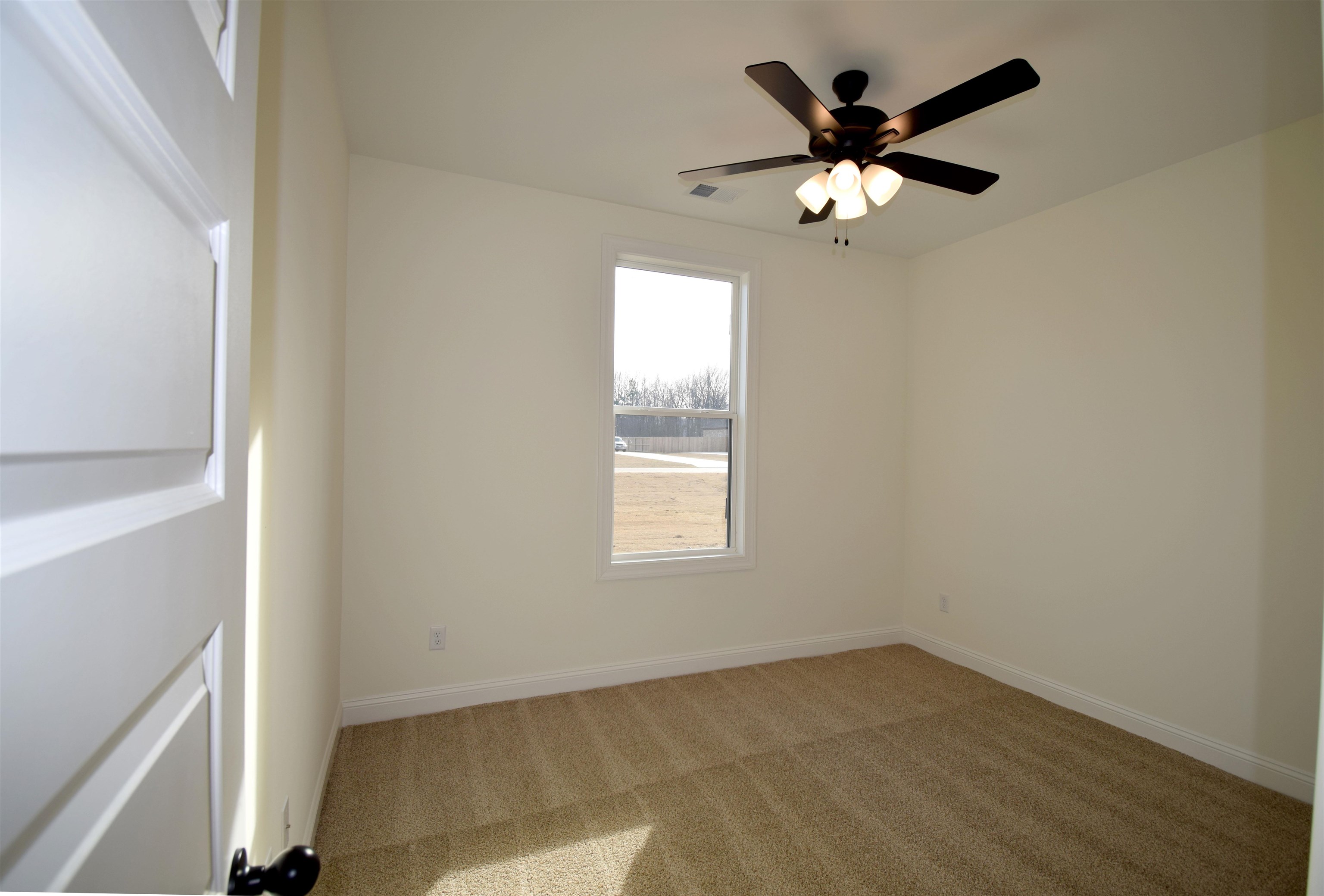 207 Centerline Roper Loop Byhalia, MS 38611 - Photo 5 of 23 a view of an empty room with a window