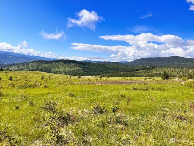 a view of a lake and sunset