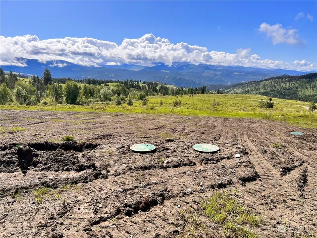 a view of a lake with a mountain