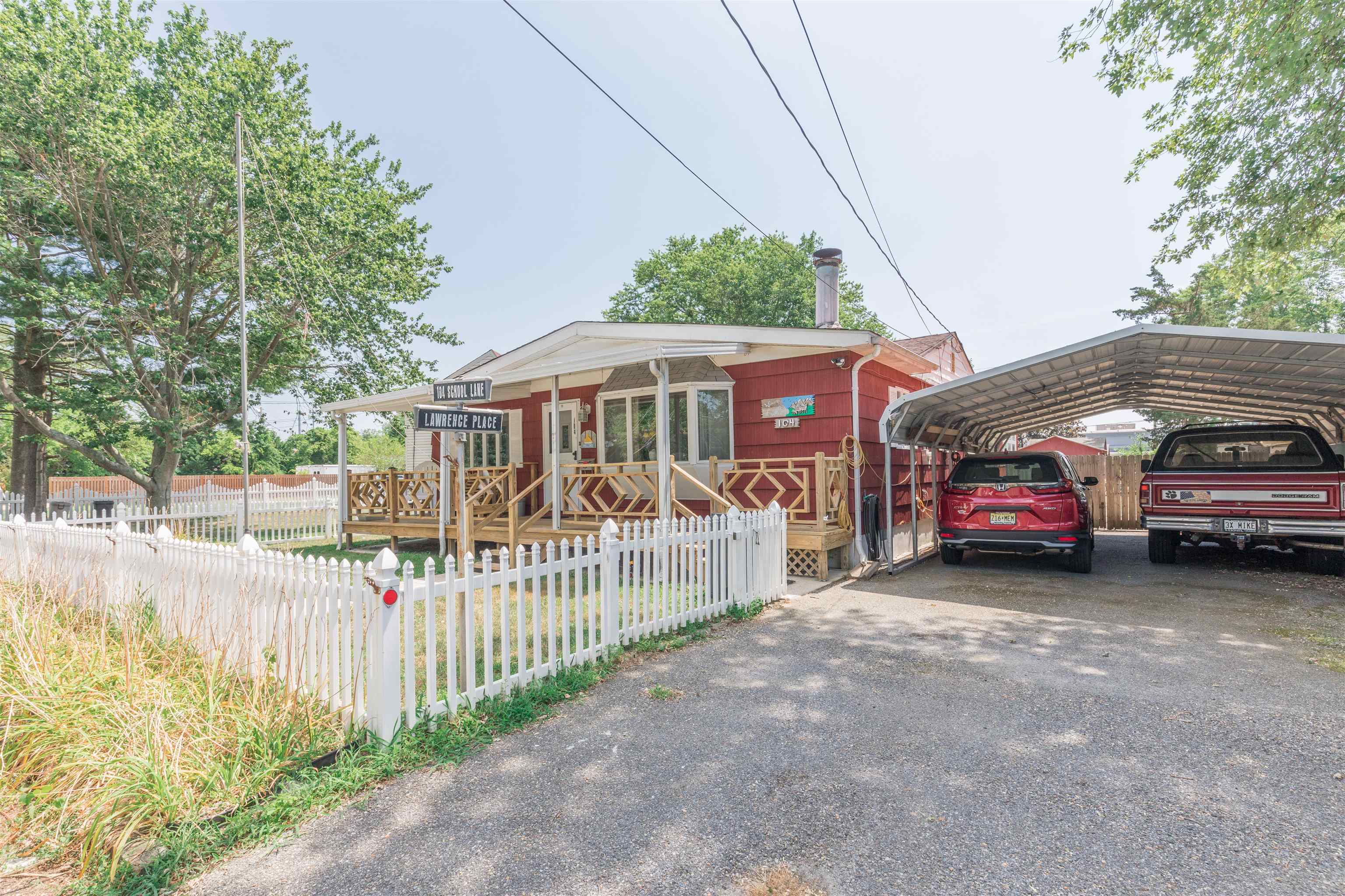 104 School Rio Grande, NJ 08242 - Photo 2 of 27 a view of a house with a small yard and sitting area