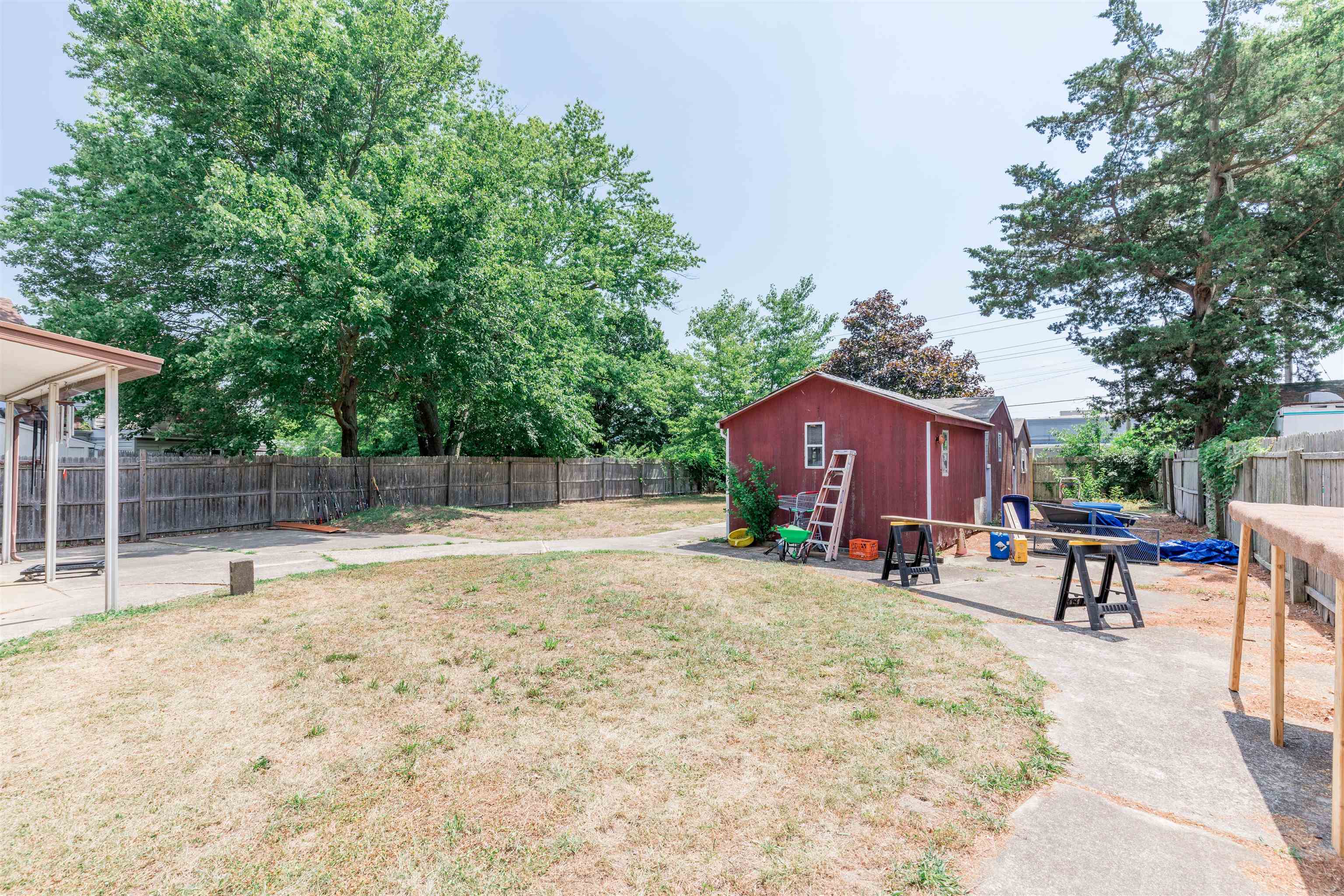 104 School Rio Grande, NJ 08242 - Photo 23 of 27 a backyard of a house with table and chairs