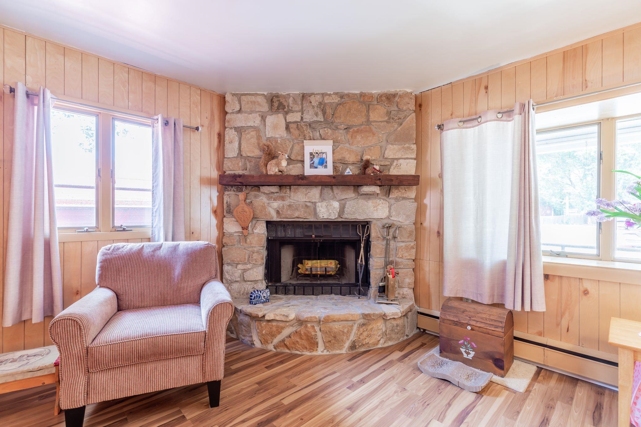 104 School Rio Grande, NJ 08242 - Photo 5 of 27 a living room with furniture and a fireplace