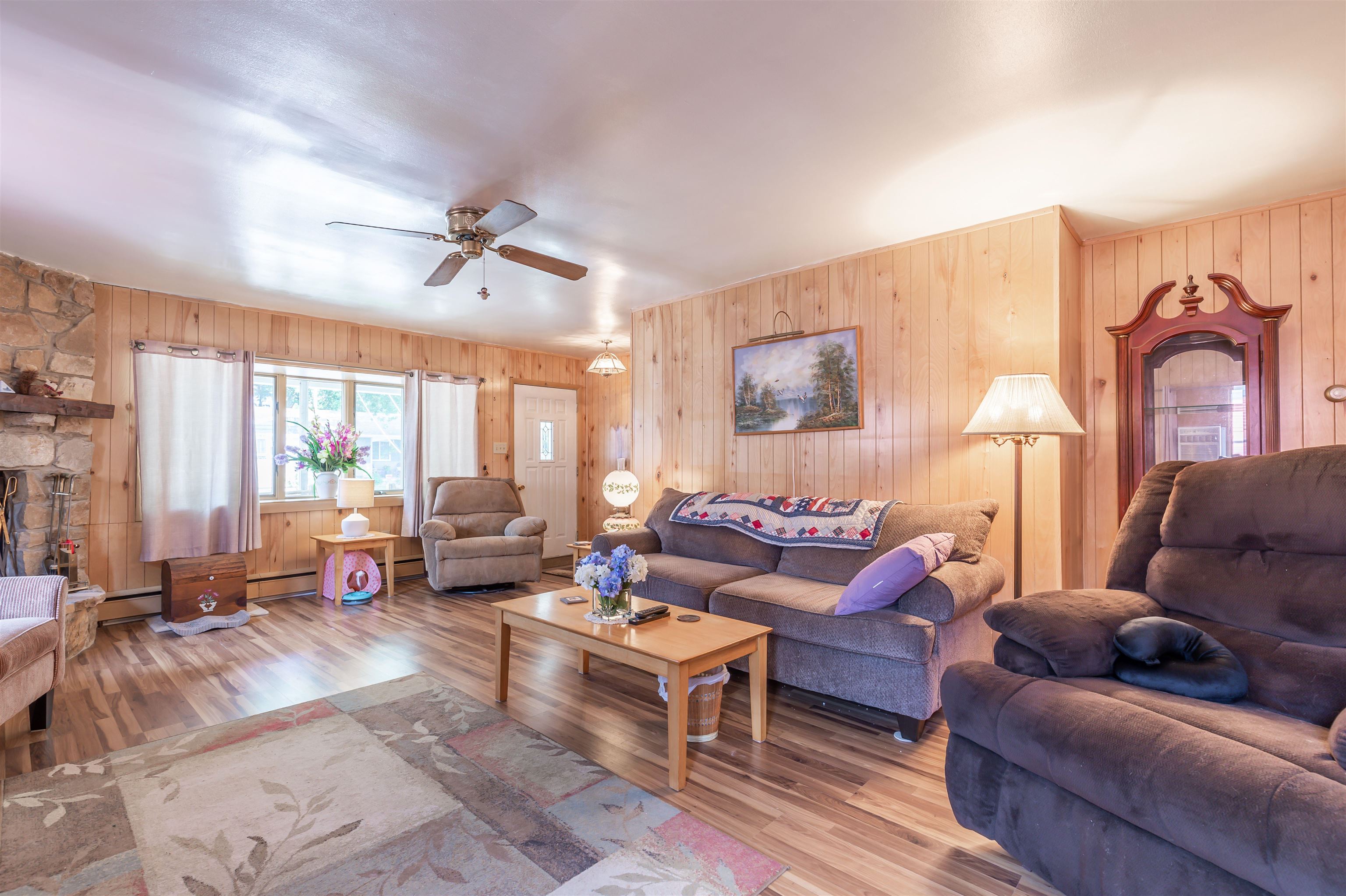104 School Rio Grande, NJ 08242 - Photo 8 of 27 a living room with furniture ceiling fan and a large window