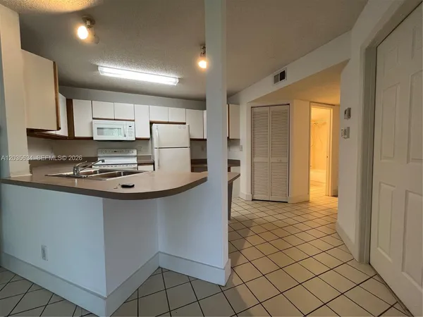 $2,325 | 4035 West McNab Road, Unit F203, Pompano Beach, FL 33069