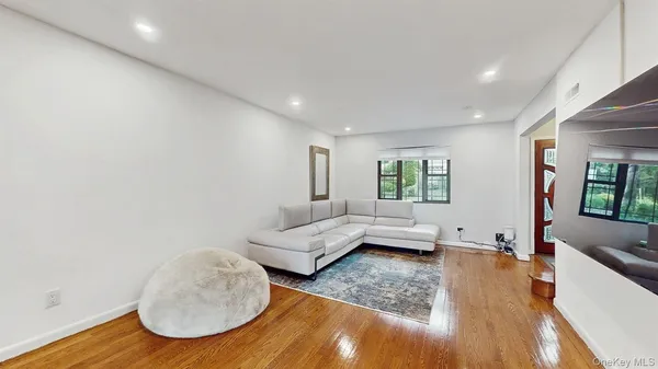 a living room with furniture and a couch