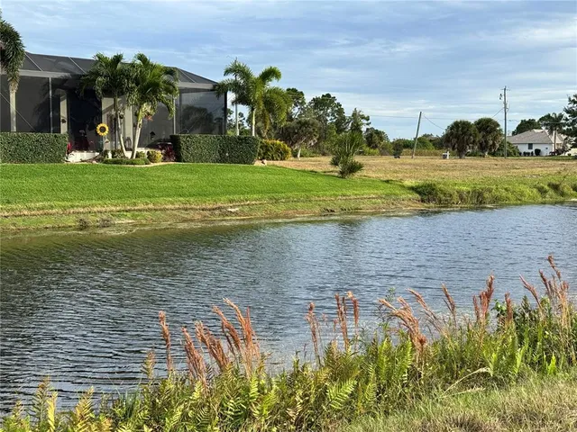 a view of a lake with a house